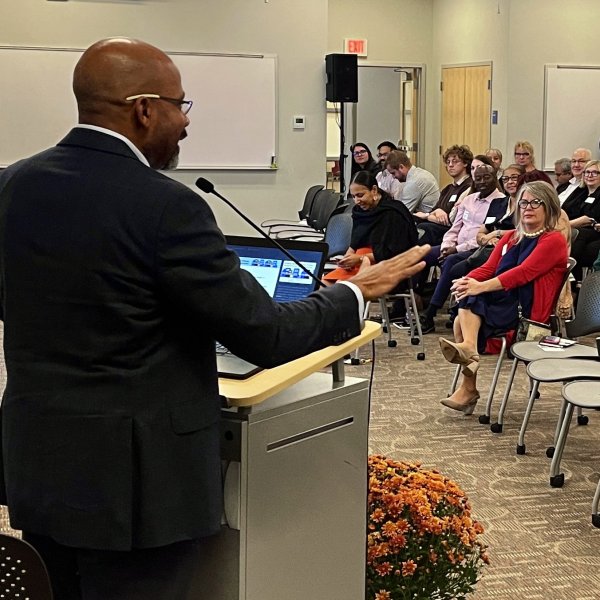 Keith Fairey addresses the audience at the housing study release event
